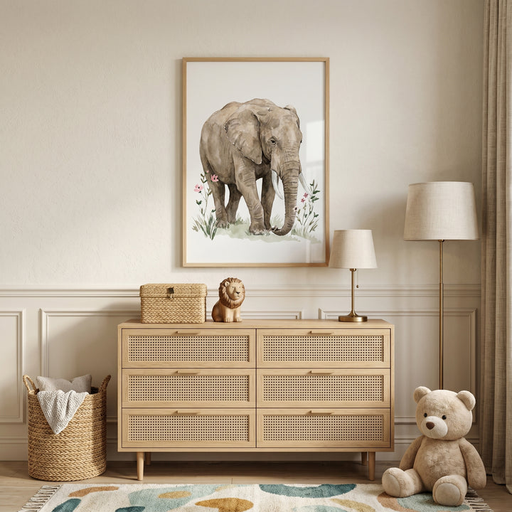 Pink flower elephant wall art hangs above a cane dresser near a teddy bear, floor lamp, and woven basket.