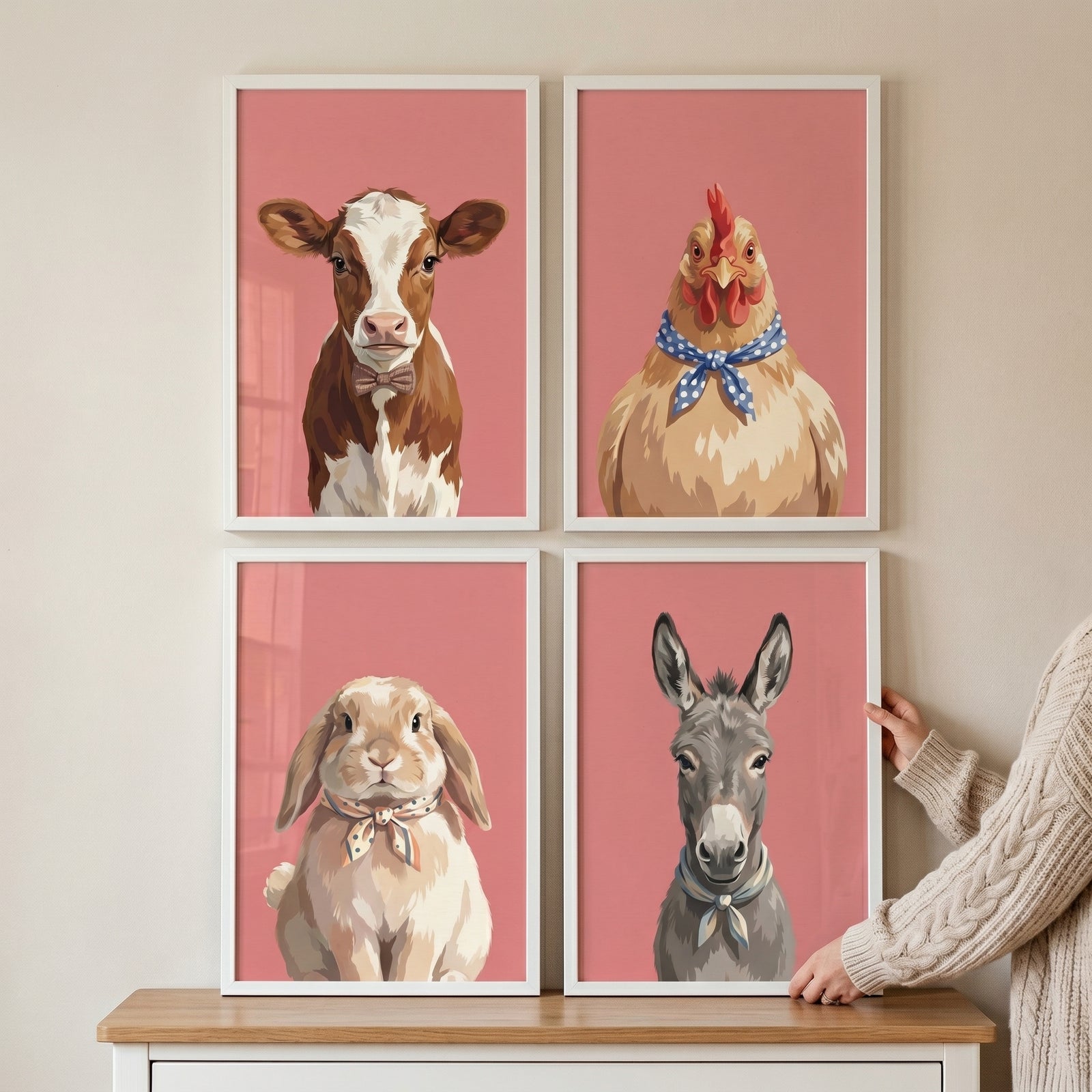 Pink necktie farm animal wall art set of 4 with a cow, chicken, rabbit, and donkey wearing neckwear in white frames.