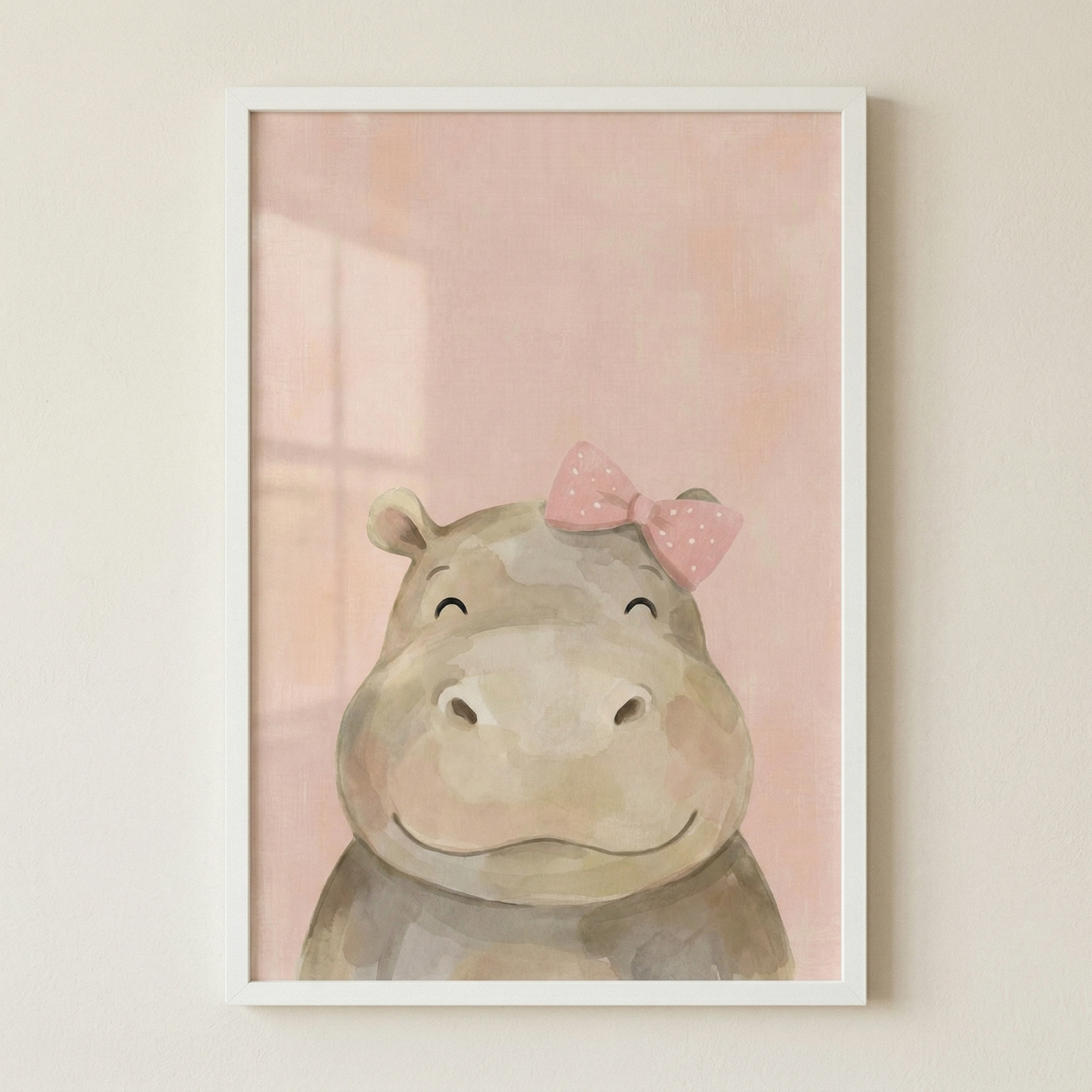 A vertically oriented white-framed illustration features a charming, simplified hippopotamus centered against a soft, muted pink background. The animal is depicted in a gentle, earth-toned wash of colors with soft edges. It has a large snout with two small nostrils, a wide, friendly smile, and closed, curved black lines for eyes. A small, pale pink bow with tiny white polka dots sits atop one side of its head.