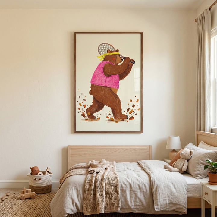 Framed pink vest tennis bear wall art hangs above a wooden bed in a bright, minimalist child's bedroom.