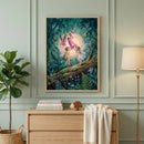 A softly styled nursery or child’s bedroom with sage green paneled walls, featuring a framed woodland illustration of two fairies on a mossy log beneath glowing foxglove flowers, displayed above a light wood dresser with books, a small hedgehog toy, a cozy blanket, a potted plant, and warm ambient lighting.