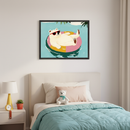Kid's bedroom with a single bed and a nightstand. A framed cartoon-style print of a polar bear in red sunglasses floating on a pink and yellow pool ring in blue water hangs centered above the bed.