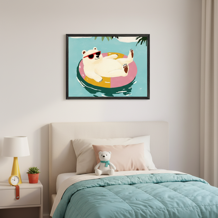 Kid's bedroom with a single bed and a nightstand. A framed cartoon-style print of a polar bear in red sunglasses floating on a pink and yellow pool ring in blue water hangs centered above the bed.