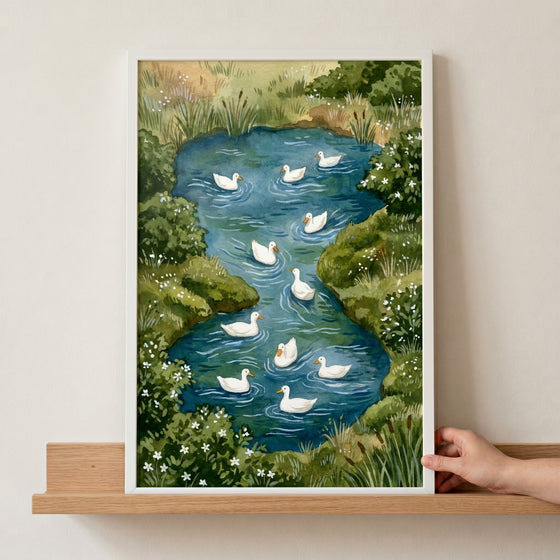 Ten white ducks glide on a blue pond in this pond swimming white duck wall art, bordered by greenery and white flowers.