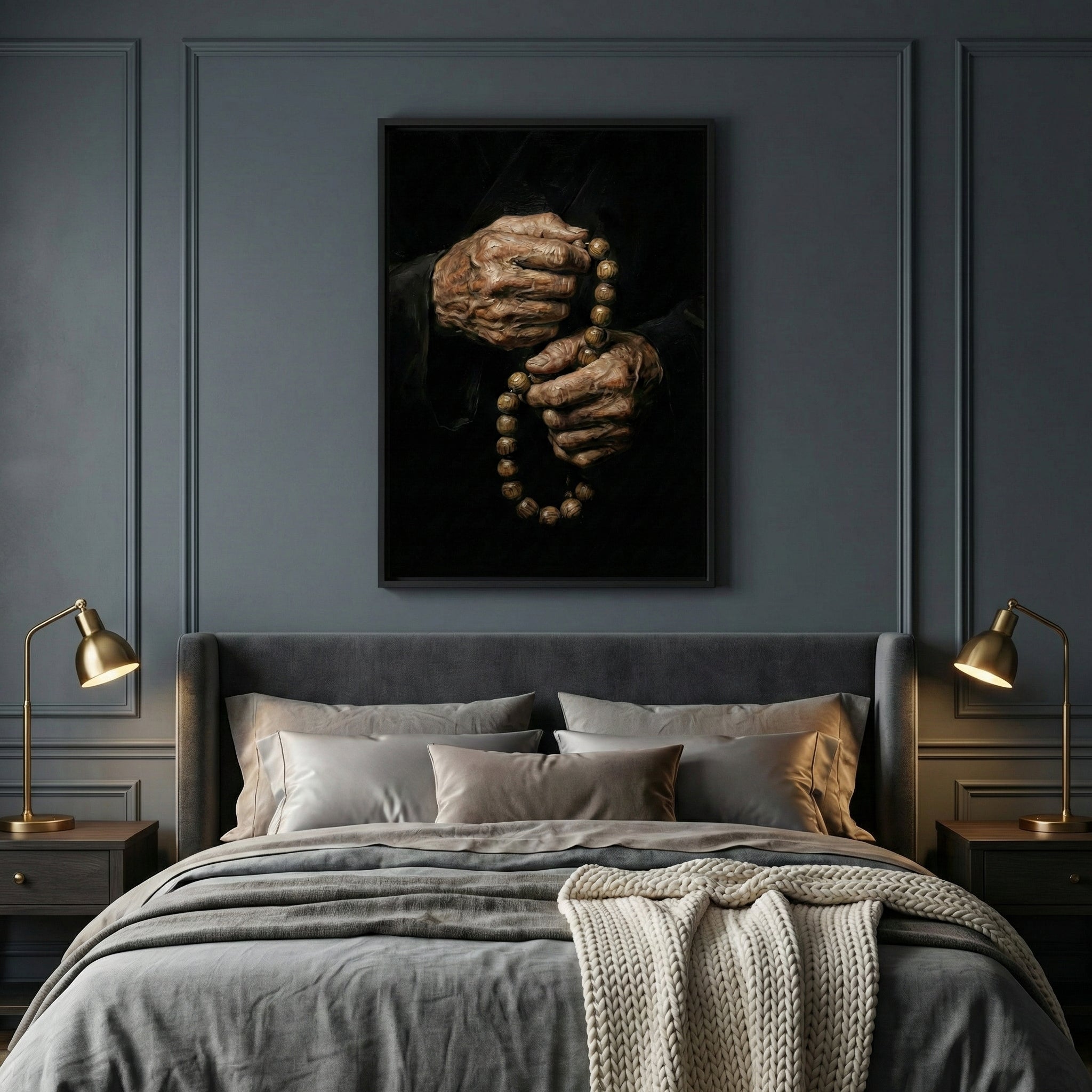 A painting of elderly hands clutching wooden prayer beads hangs above a neatly made bed in a softly lit, elegant bedroom. The artwork adds a spiritual and contemplative touch to the cozy, modern space.