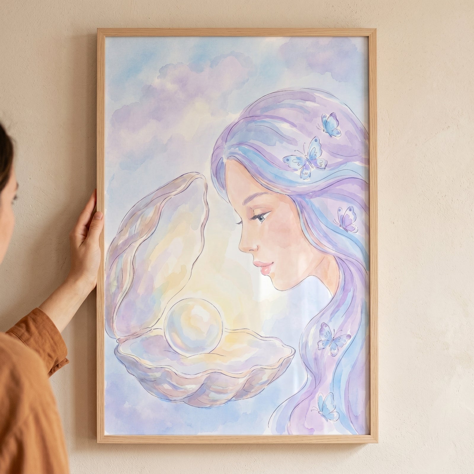 Purple hair mermaid wall art featuring a woman looking at a pearl inside a shell with butterflies in her hair.