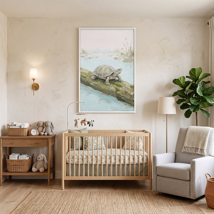 Neutral nursery featuring a wooden crib, grey rocker, and red eared slider turtle wall art on a textured wall.