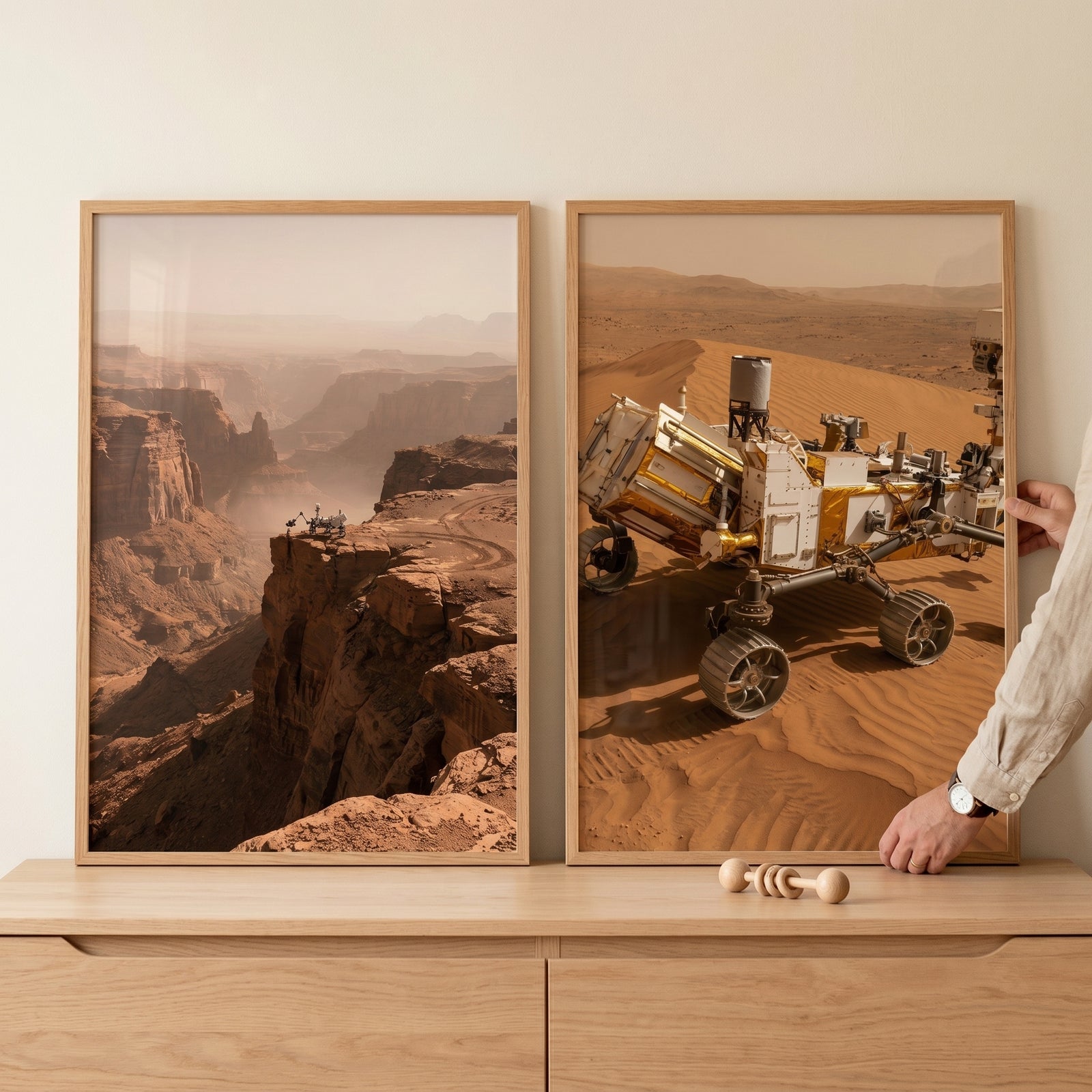 Two framed prints of rovers on desert terrain, red planet landscape rover wall art set of 2, on a wooden cabinet.