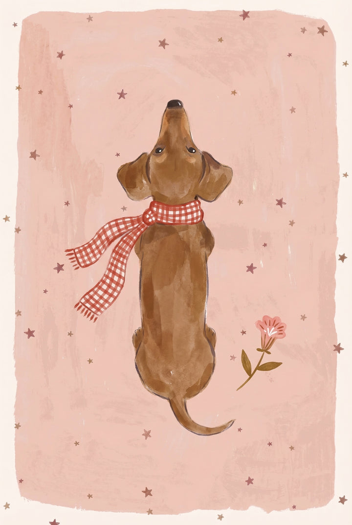 A brown dachshund sitting upright and looking upward while wearing a red gingham scarf with a small pink flower nearby against a muted pink background with scattered stars.
