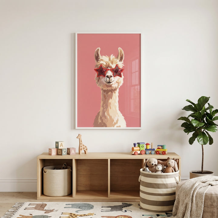 Red star glasses llama wall art hangs in a nursery above a wooden shelf with toys, storage baskets, and a green plant.