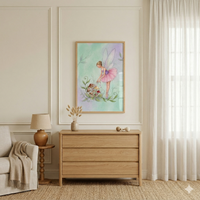 A light-filled room features a piece of whimsical art on a wall with decorative molding. The illustration depicts a fairy with large, translucent wings wearing a pink tutu, interacting with a cluster of mushrooms and greenery against a pastel background. Below the art is a three-drawer wooden dresser. To the left, a small round wooden table holds a classic lamp, next to a neutral-toned armchair with a draped throw. Large windows with sheer white curtains let in light, and a woven rug covers the floor.