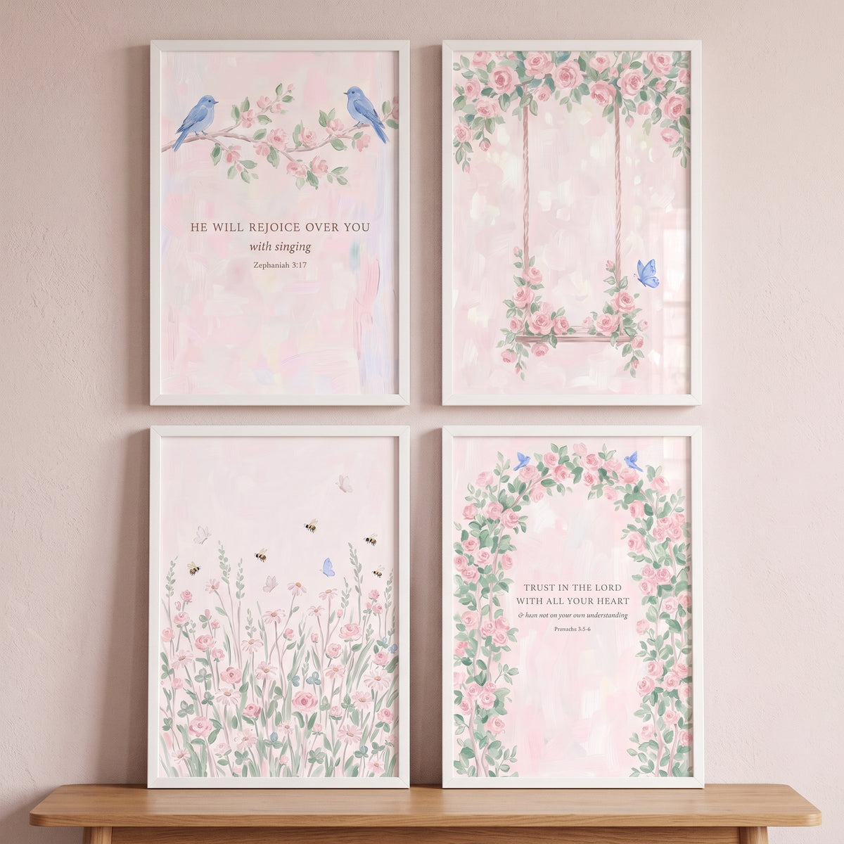 Romantic watercolor blush garden wall art set of 4 with birds, floral designs, and bible verses on a pink wall.