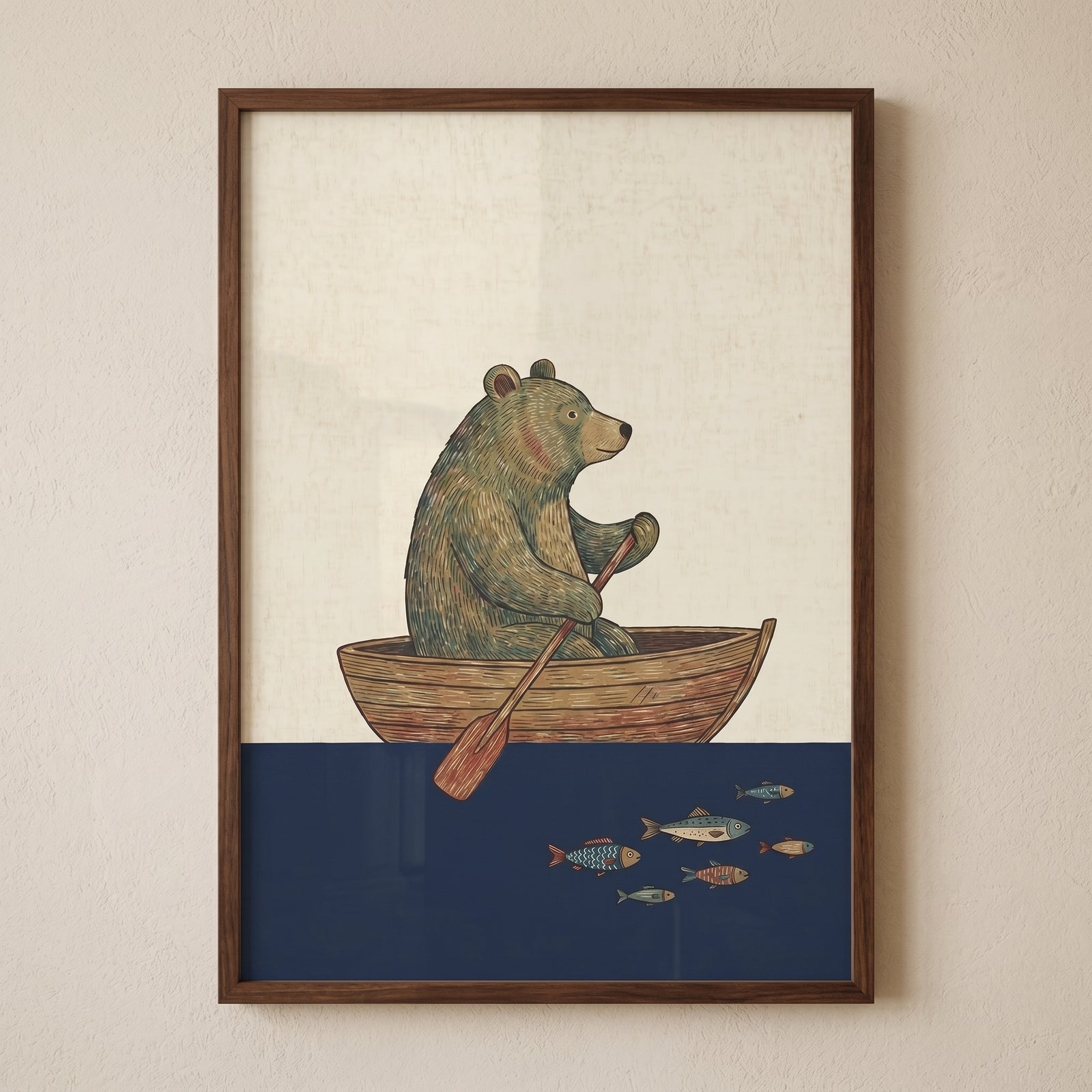 Framed rowing wooden boat bear wall art shows a bear on dark blue water with small fish swimming below.