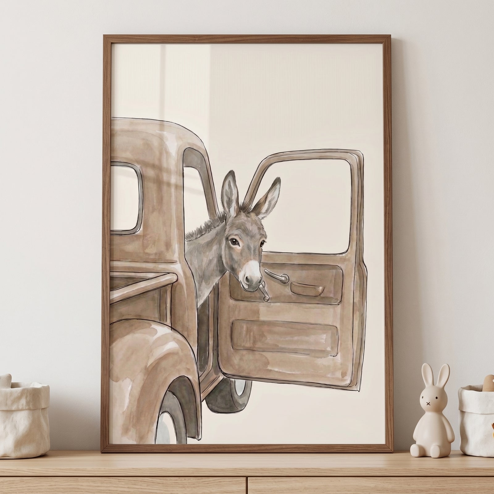 Rustic brown truck donkey wall art of a grey donkey peeking out from the open door of a vintage brown truck.