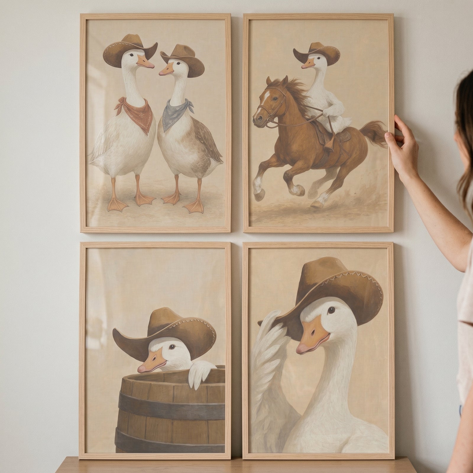 Rustic country western cowboy goose artwork set of 4 features geese in hats riding a horse and peeking from a barrel.