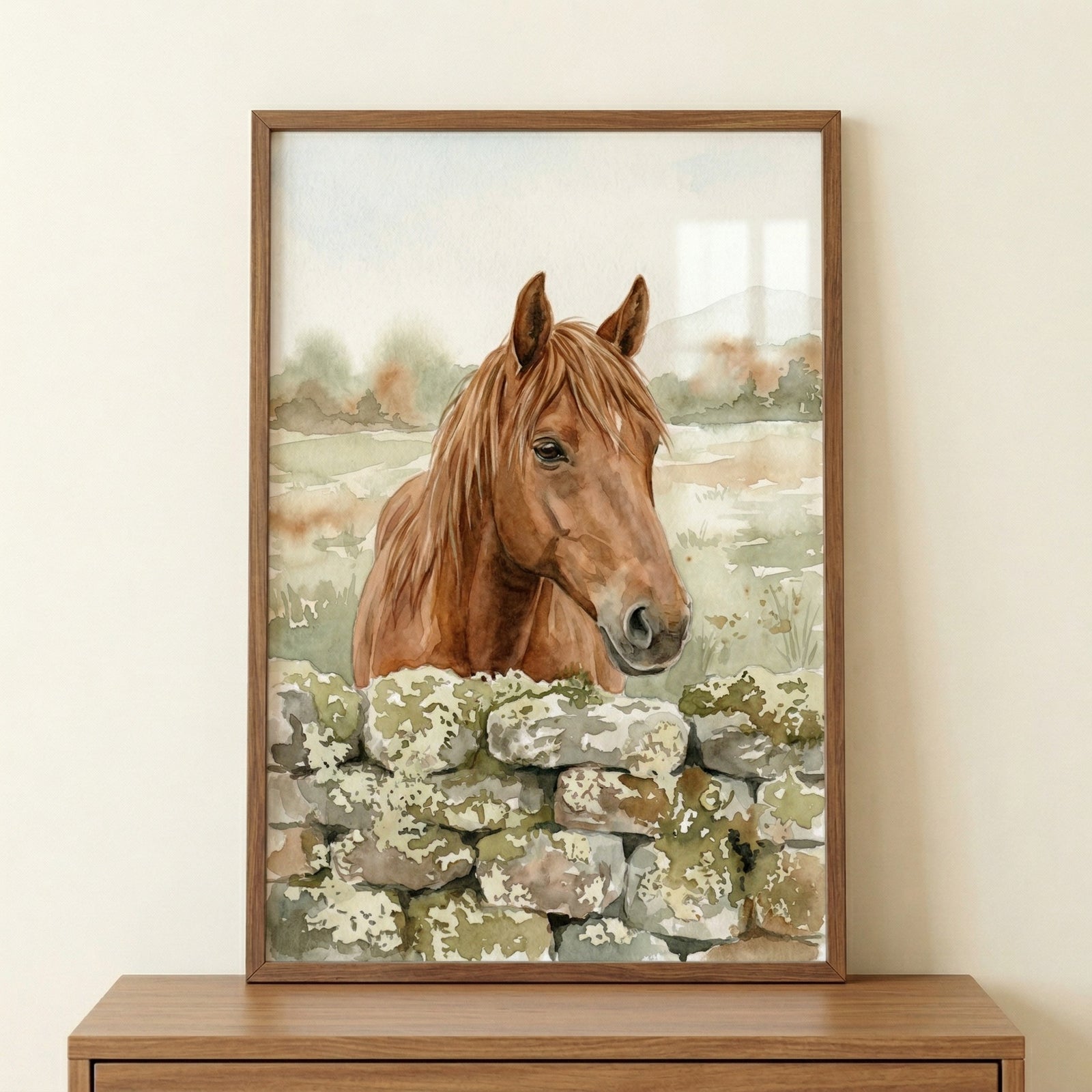 A vertical watercolor illustration features a chestnut horse with a flowing brown mane peering over a textured, moss-covered stone wall. The artwork uses a soft, muted color palette to create an ethereal and peaceful atmosphere. 