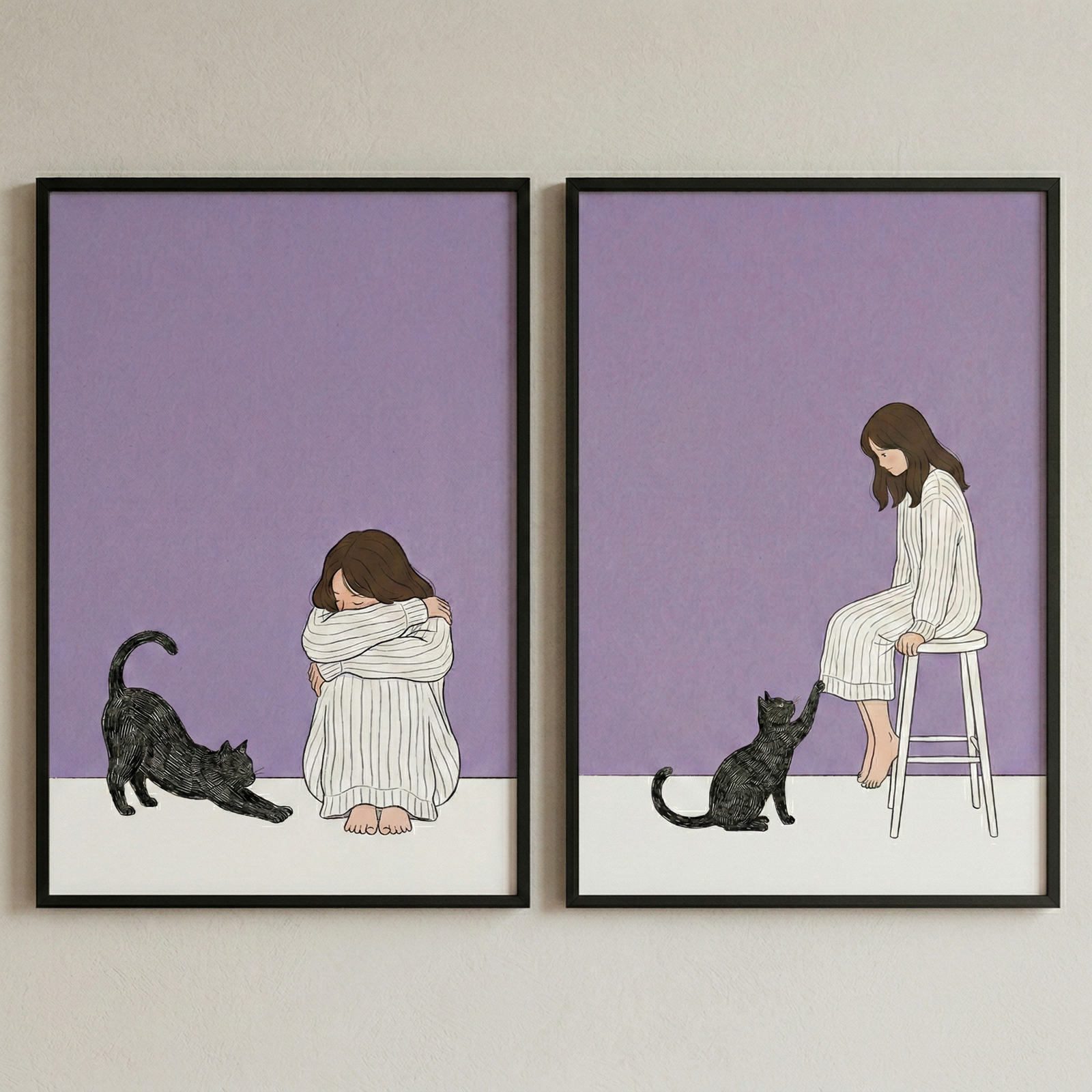 Two framed illustrations hung side-by-side against a neutral wall. Each features a girl with long brown hair wearing a white striped dress and a black cat against a minimalist purple and white background. In the left frame, the girl sits curled on the floor while the cat stretches towards her. In the right frame, the girl sits on a tall white stool while the cat reaches up a paw towards her leg.