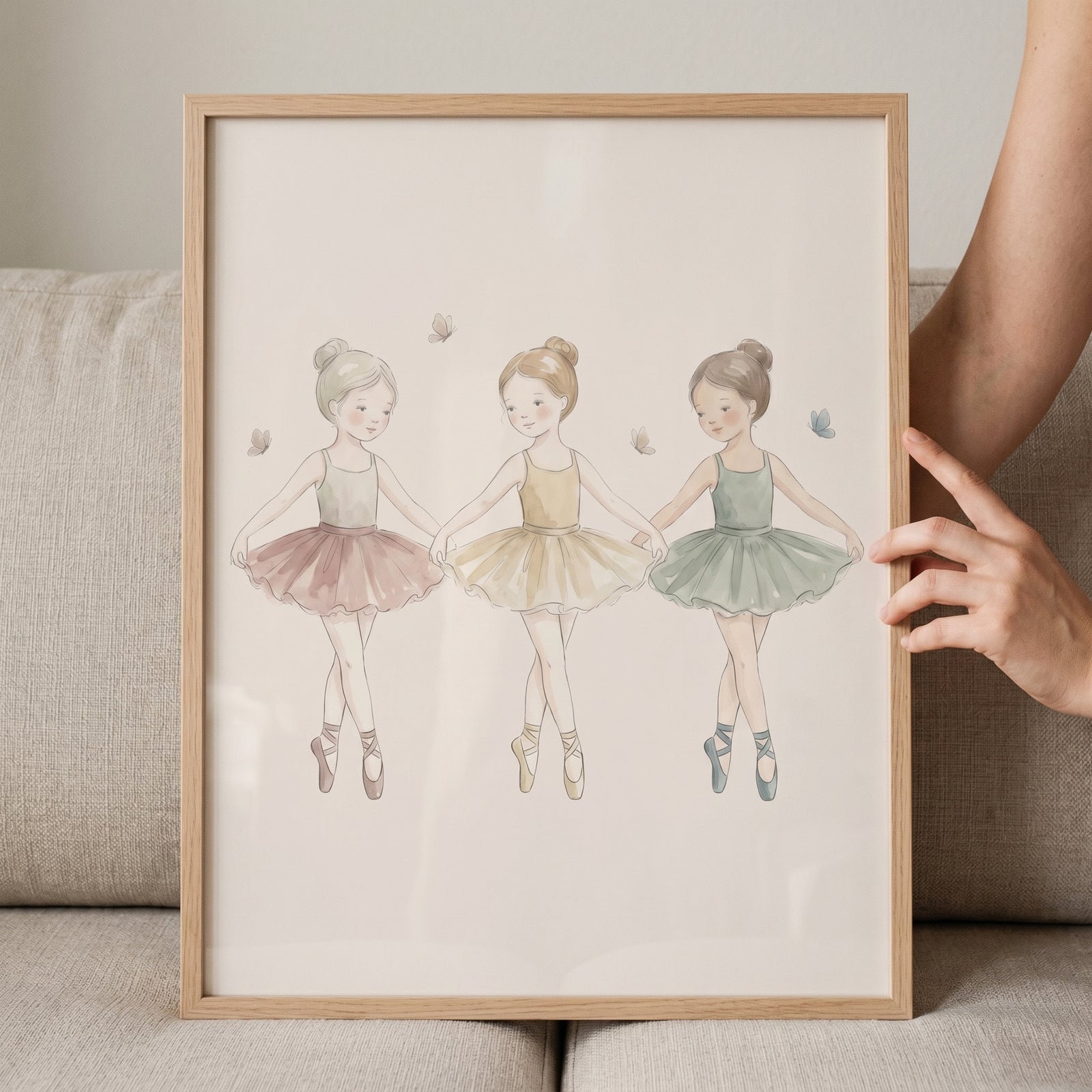 Three girls holding hands in this sage green tutu ballerina artwork alongside dancers in pink and gold with butterflies.