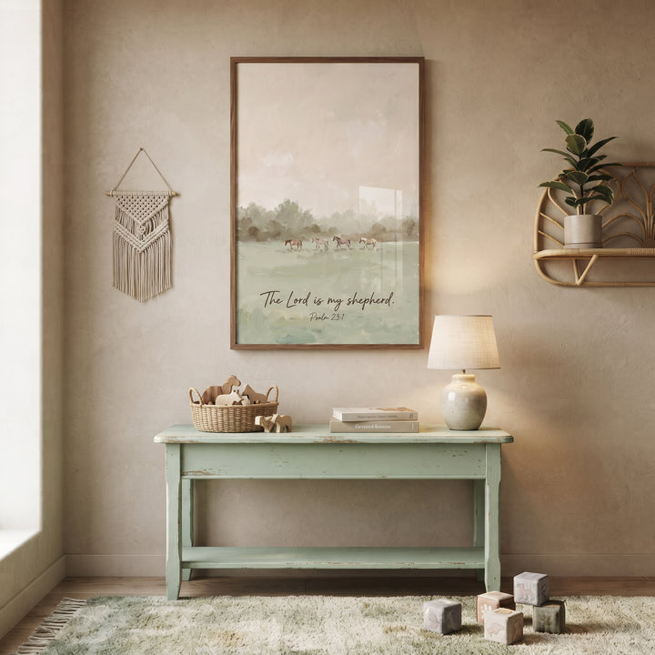 Sage psalm 23 horse wall art above a green console table with a lamp and toys. Macrame and plants decorate the room.