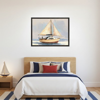 Modern nautical bedroom with a wooden bed, white bedding, and navy, tan, red pillows. A wooden nightstand with a sailboat lamp is on the left. Centered above the bed is a framed impressionistic painting of a sailboat on calm water.