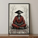 A framed illustration shows a skeleton sitting in a meditative, cross-legged pose on a wooden floor. The skeleton is dressed in a dark red traditional East Asian-style robe and wears a black conical hat. In the background, delicate, sketch-like bamboo stalks are drawn against an off-white, textured surface. The piece is encased in a slim black frame and is resting on a wooden surface against a plain, neutral wall.
