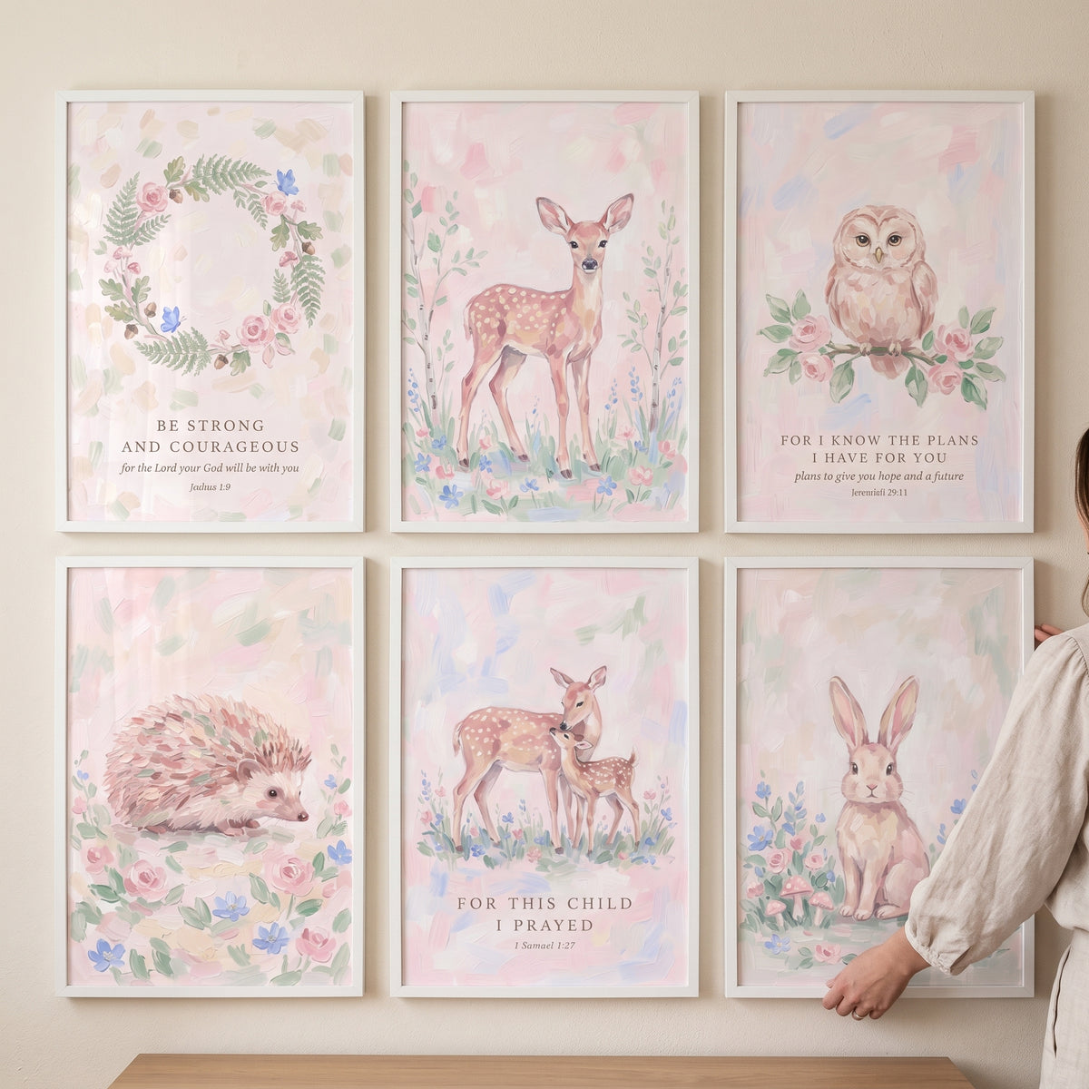 Scripture girl forest floral wall art set of 6 with woodland animals like a deer, owl, hedgehog, and bunny in white frames.
