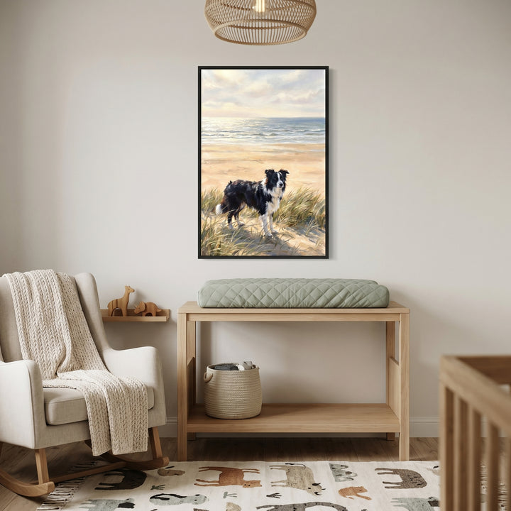 Nursery featuring sea grass dunes border collie dog artwork above a wooden changing table and a rocking chair.