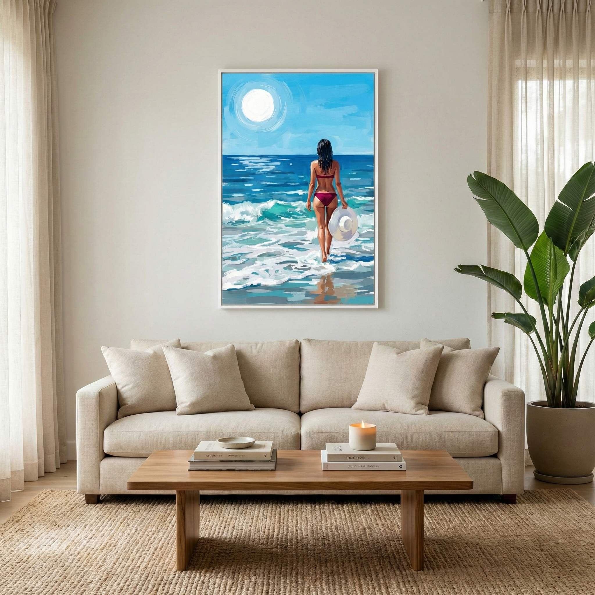 A serene living room scene features a central vertical artwork displayed on a light-colored wall. The canvas captures a woman in a burgundy bikini from behind as she heads into the ocean waves, carrying a white sun hat. A bright sun hangs in the blue sky. 
