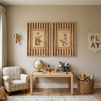 Sepia rustic cowboy goose wall art set of 2 hangs above a wooden play table with blocks, a globe, and stuffed animals.