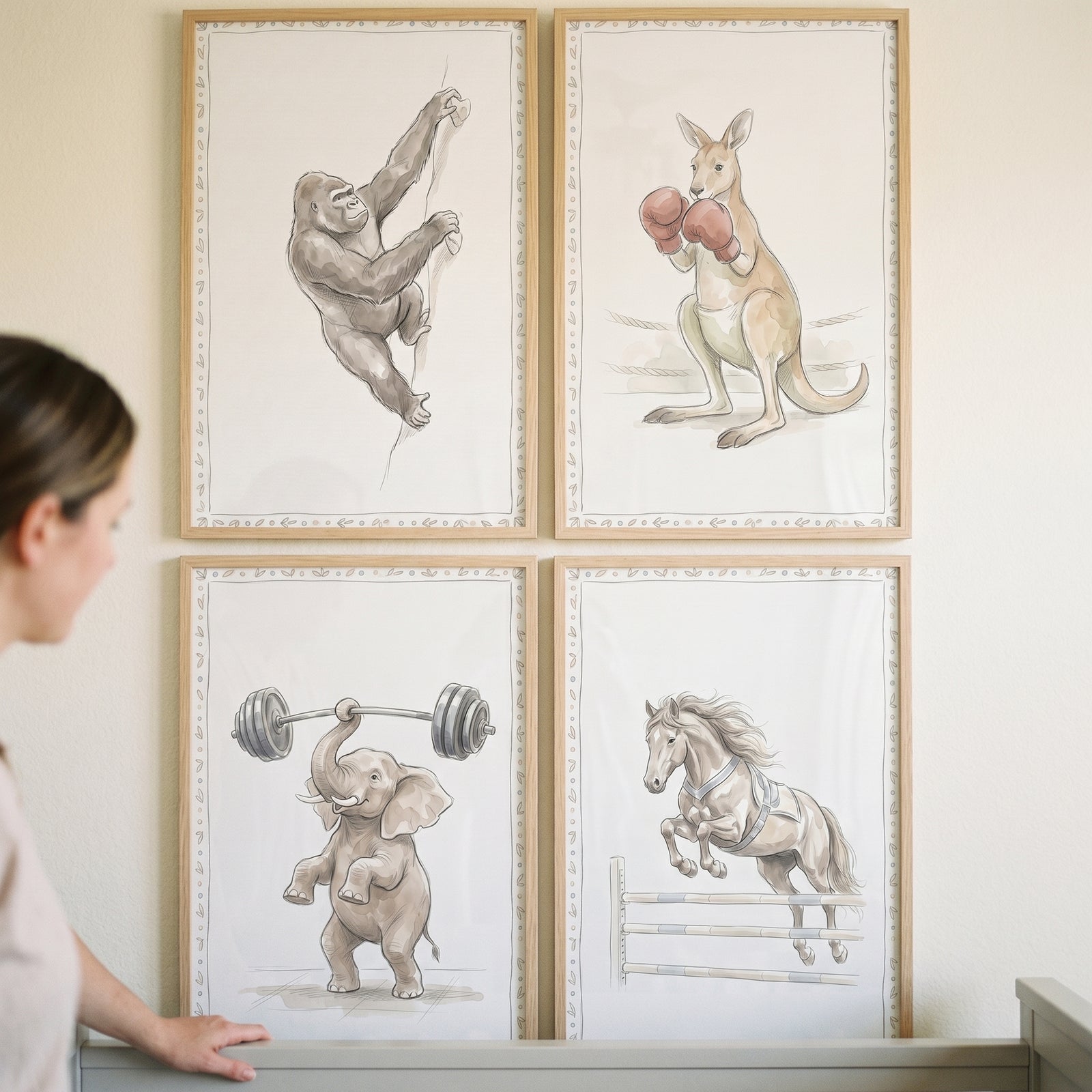 Sepia tone athletic animals wall art set of 4 with a climbing gorilla, boxing kangaroo, lifting elephant, and jumping horse.