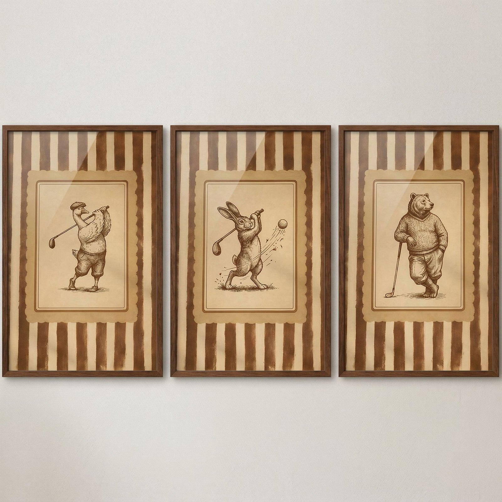 Sepia toned golfing animal wall art set of 3. Illustrations of a goose, rabbit, and bear in vintage golf attire.
