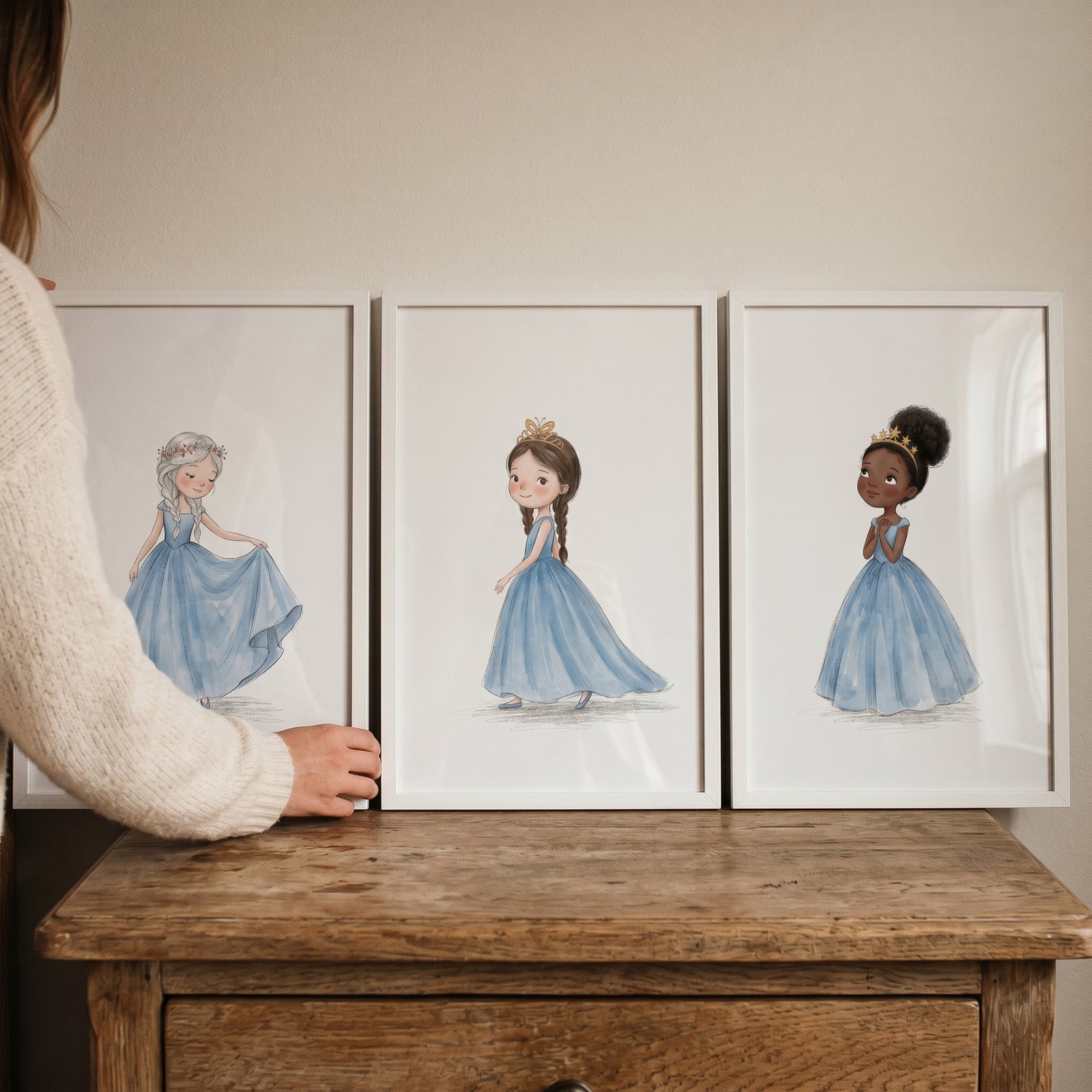 Serene blue gown princess wall art set of 3 featuring diverse girls in light blue gowns, displayed in white frames.