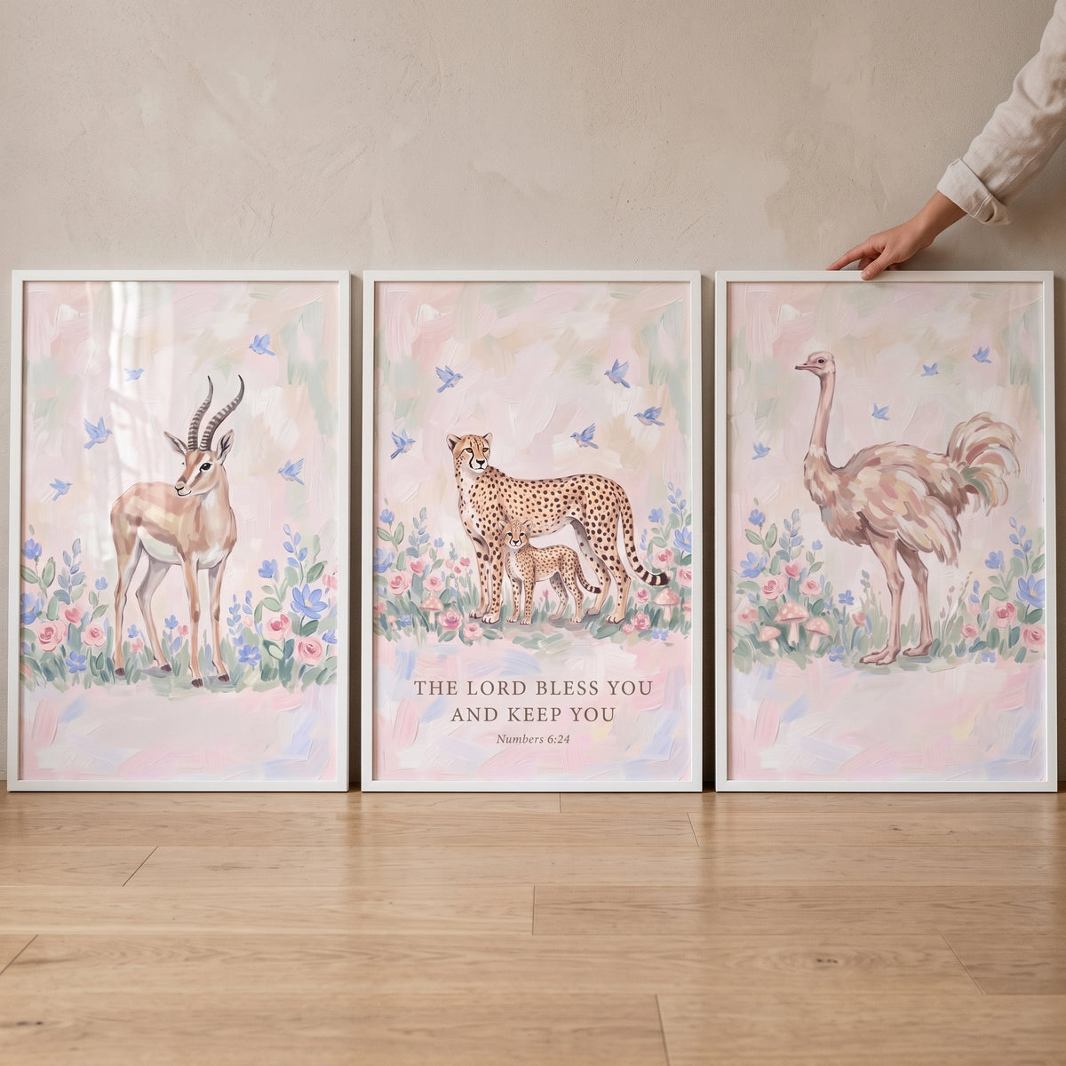 Serene floral african animals wall art set of 3 with an antelope, cheetah with cub, and ostrich under a biblical blessing.