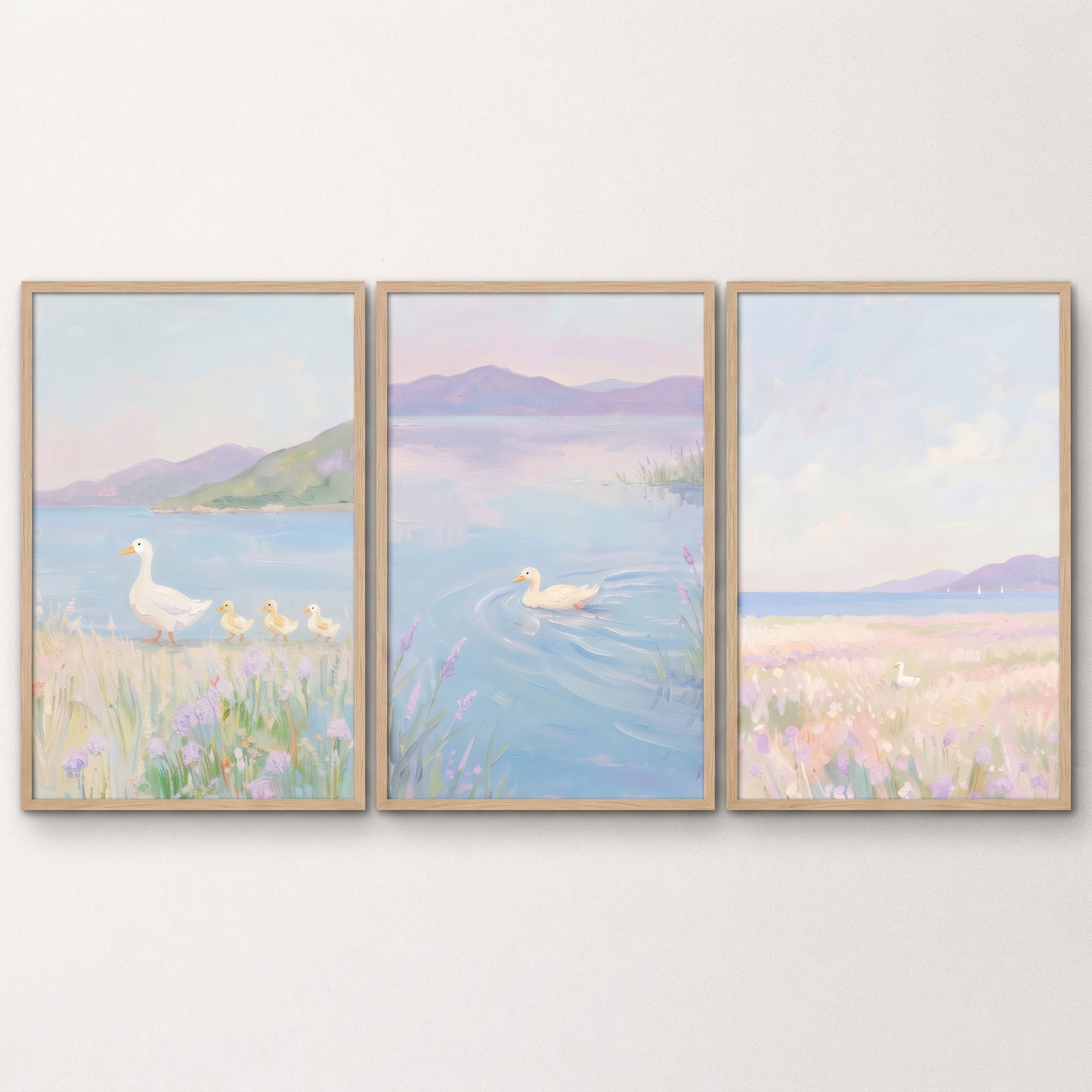 Serene lilac lakeside duck wall art set of 3 features white ducks by calm water and hills in soft pastel tones.