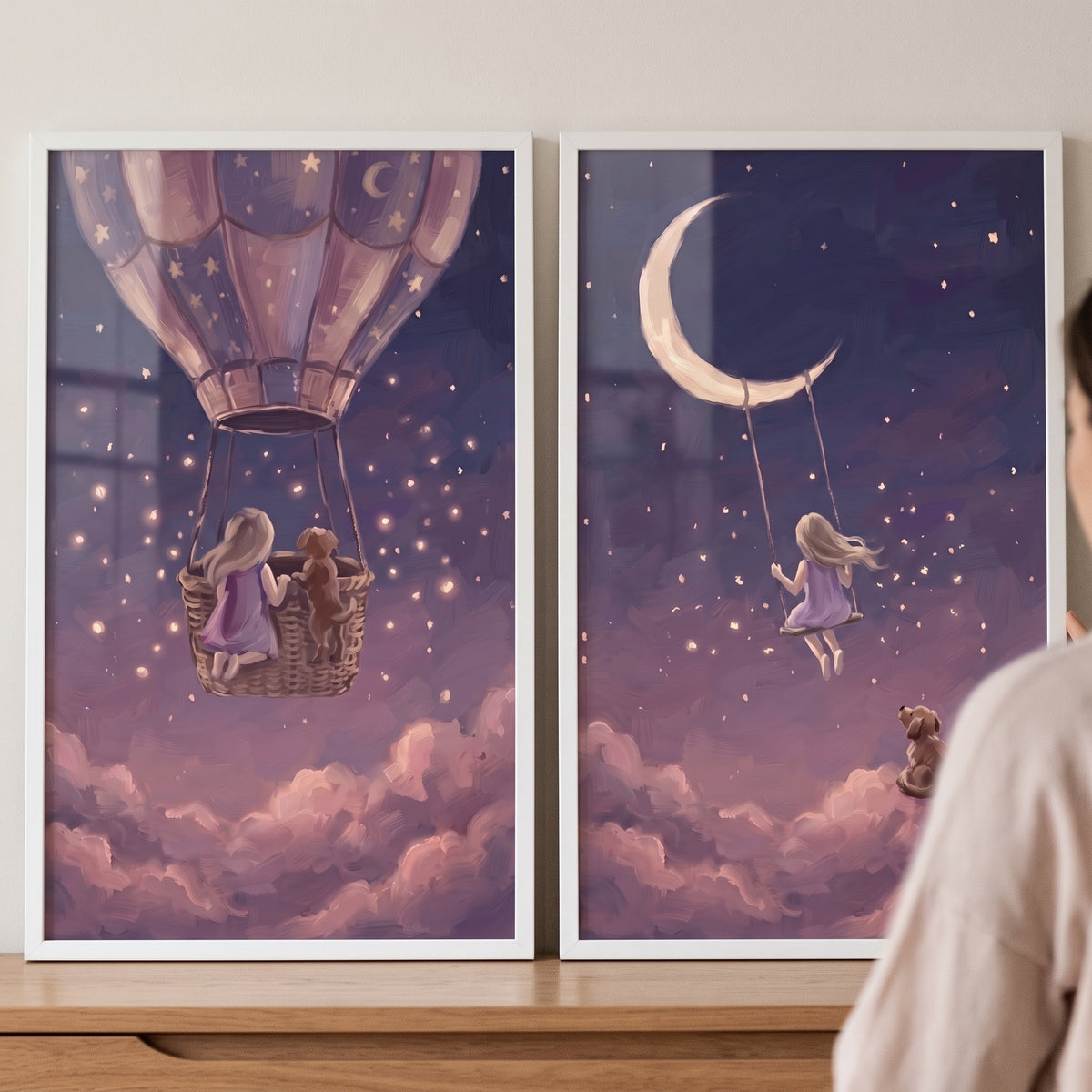 Serene night girl dog wall art set of 2 featuring a girl and dog in a hot air balloon and on a moon swing over clouds.