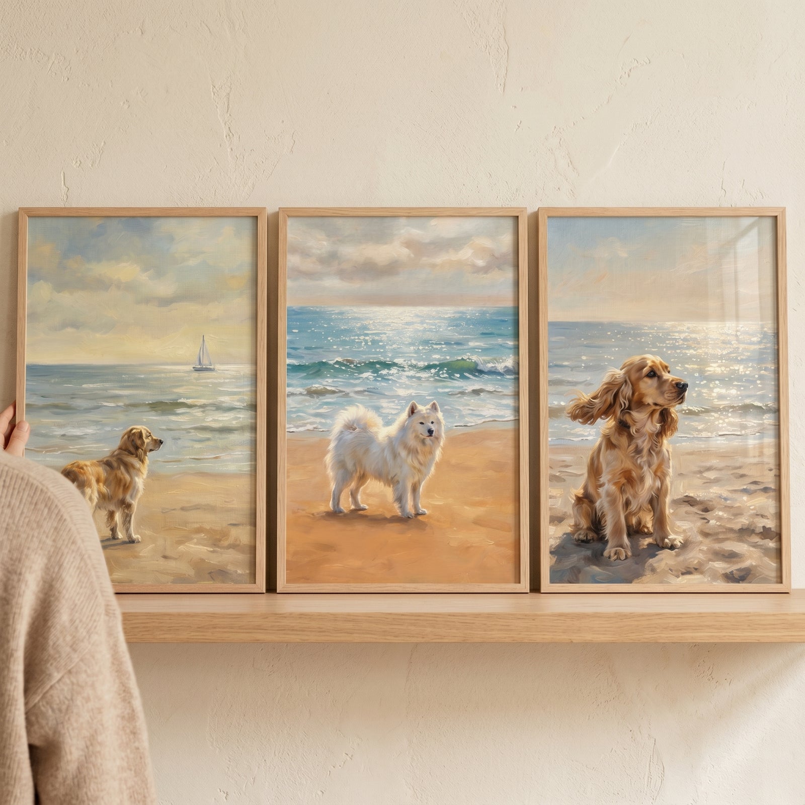 Serene oceanfront sandy dog wall art set of 3 featuring a golden retriever, a white fluffy dog, and a cocker spaniel.