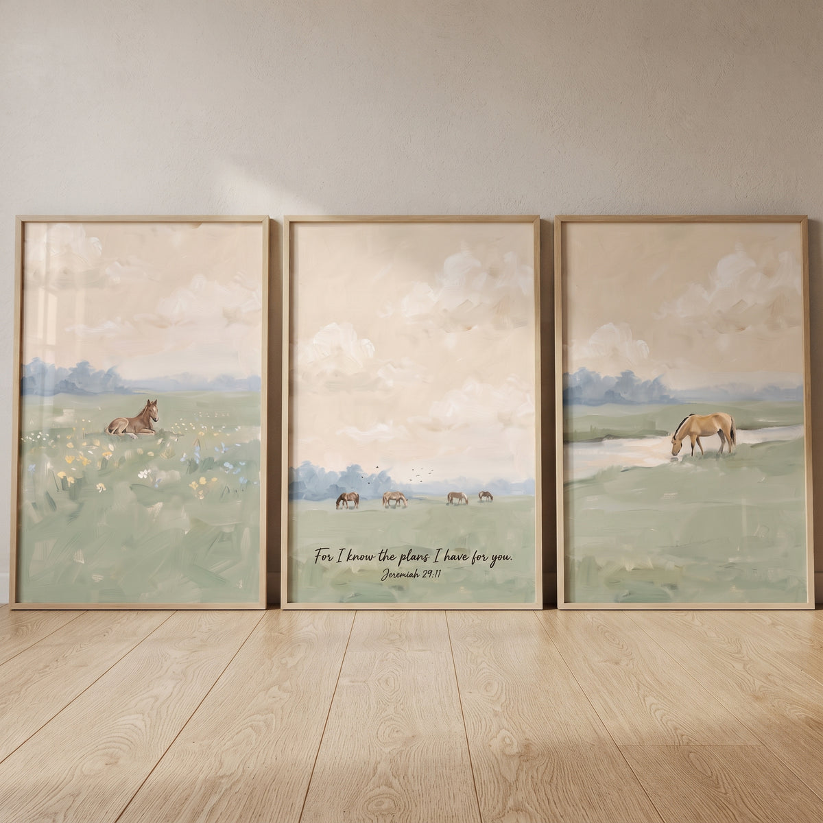 Serene sage landscape horse wall art set of 3 shows horses in a field with a Bible verse under a soft, cloudy sky.