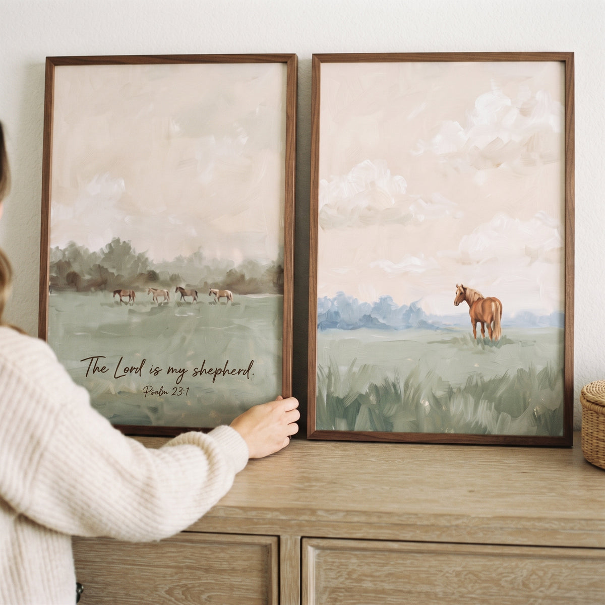 Serene sage meadow horse wall art set of 2 with horses and Psalm 23 text held on a wooden dresser.