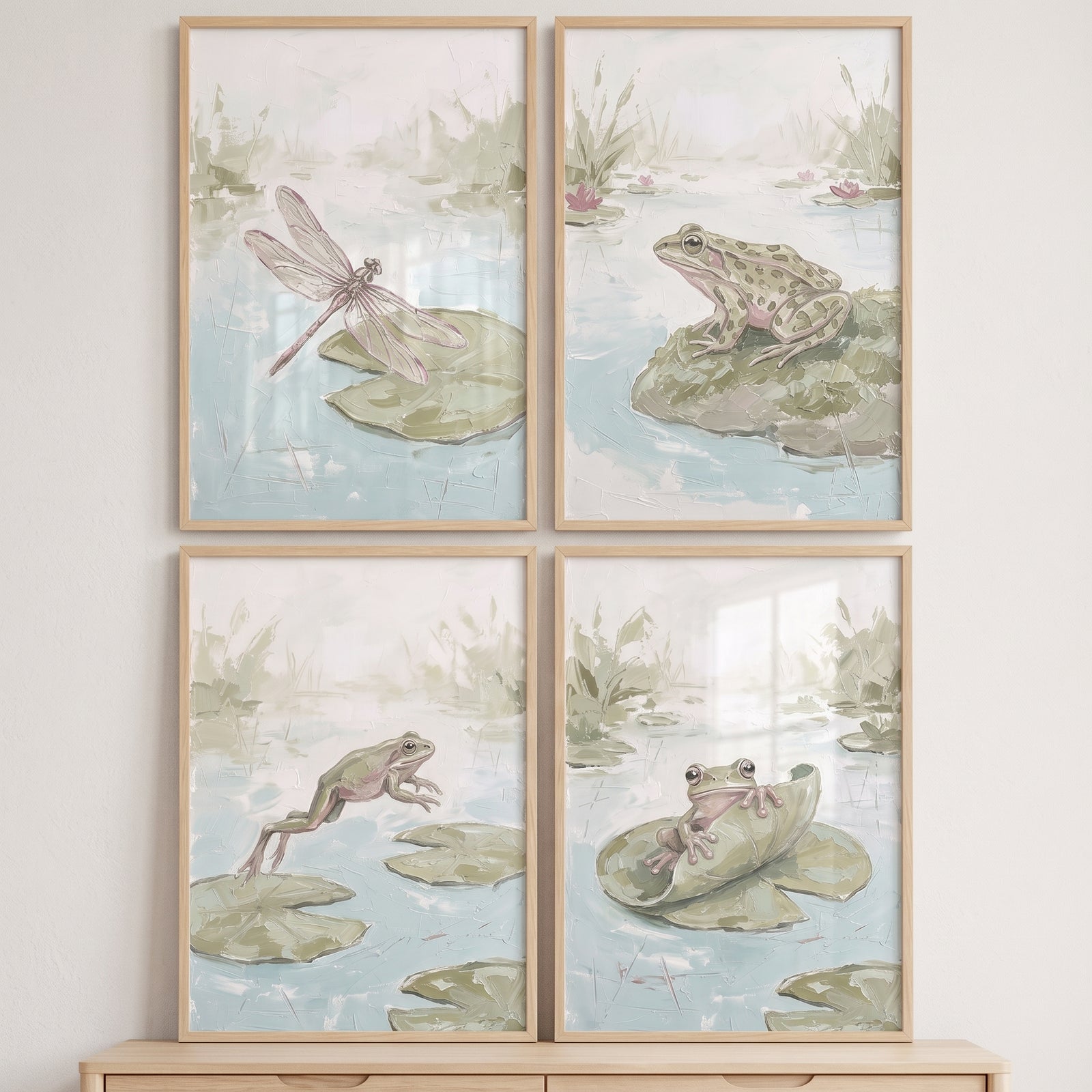 Serene sage pond animals wall art set of 4 featuring frogs and a dragonfly on lily pads in light wood frames.