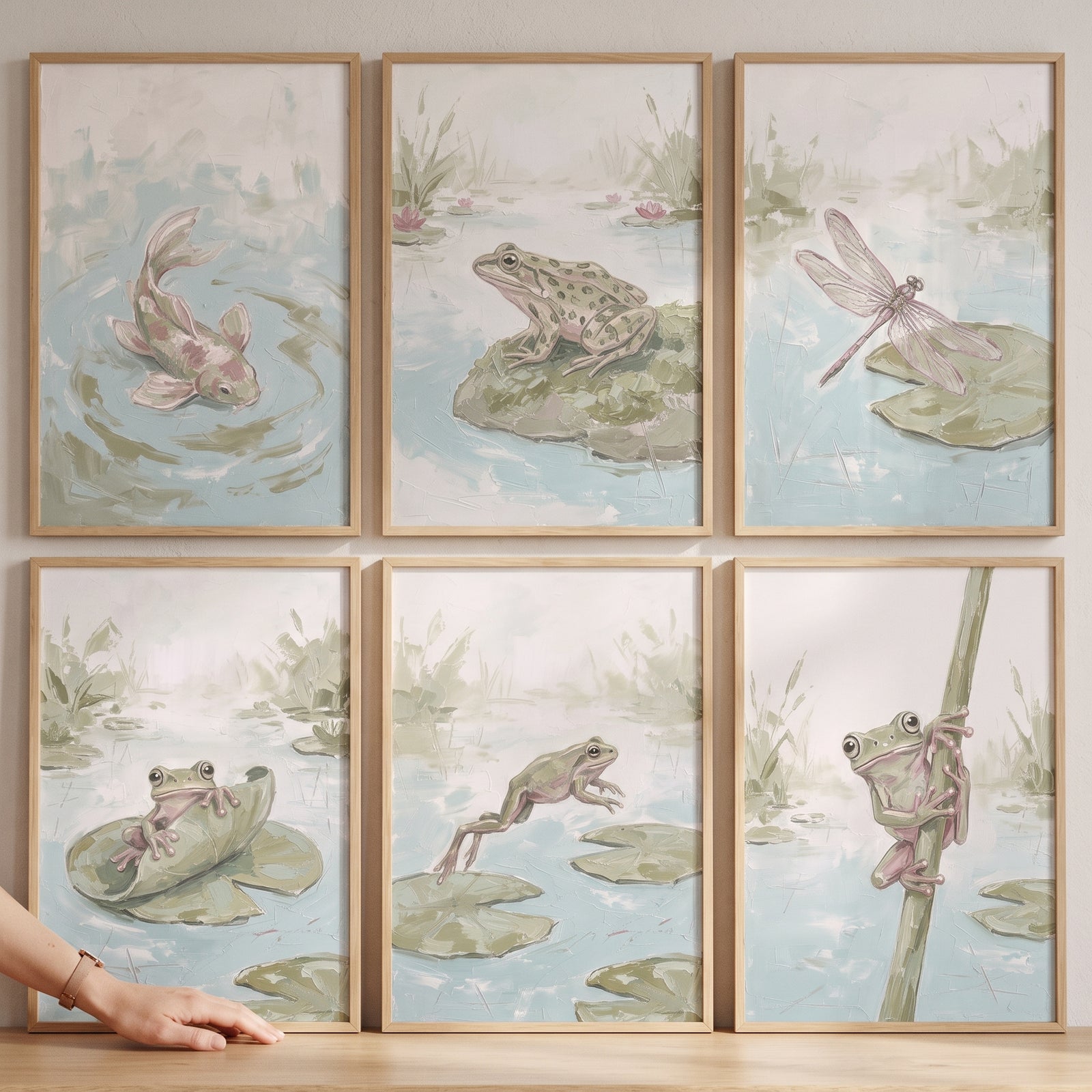 Serene sage pond animals wall art set of 6 features frogs, a fish, and a dragonfly in muted green and blue water scenes.