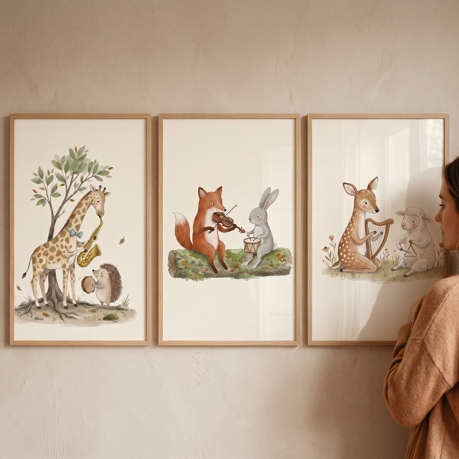 Serene watercolor musical animals wall art set of 3 shows whimsical animals playing music as a person stands nearby.