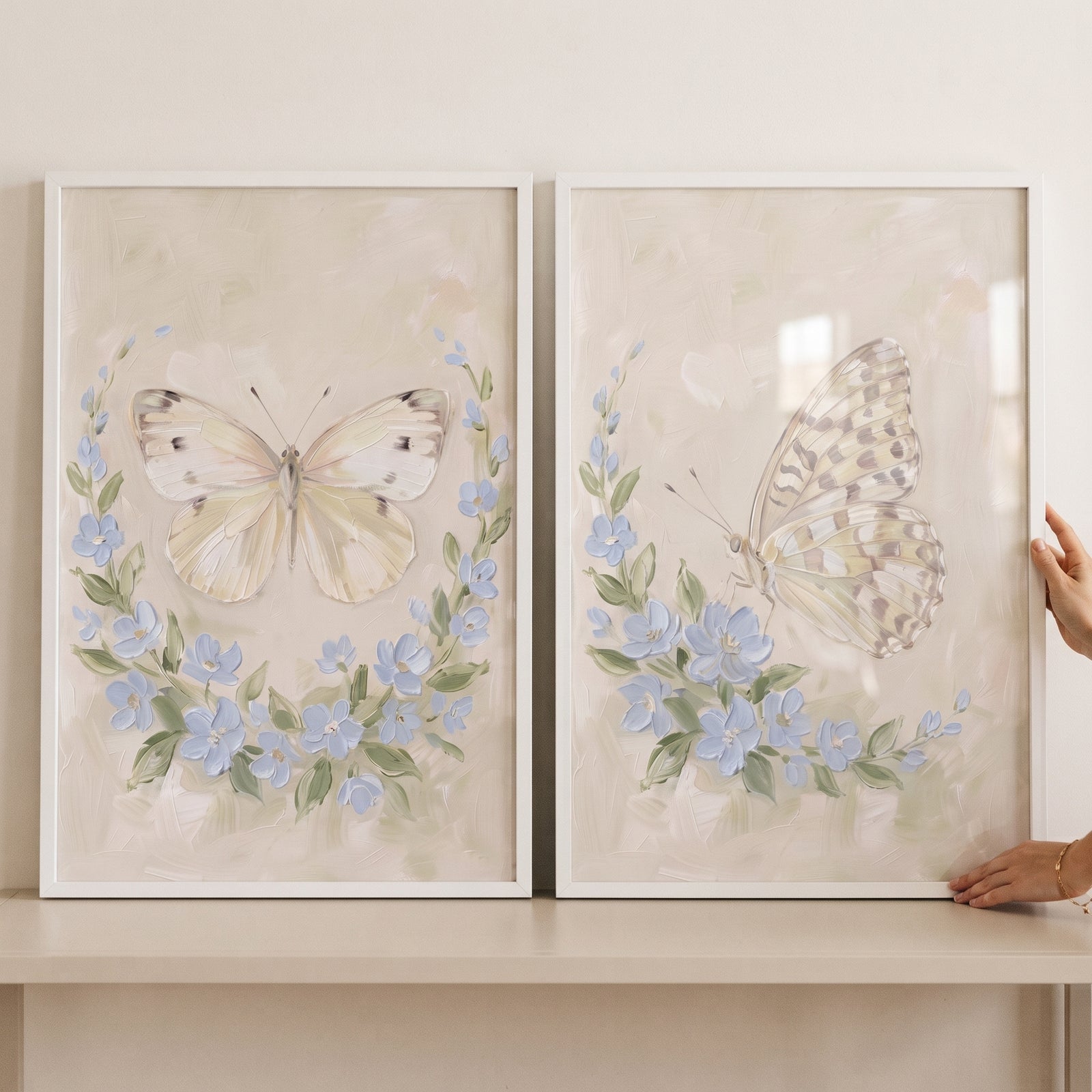 Shabby chic cottage butterfly wall art set of 2 with butterflies and blue flowers in white frames.