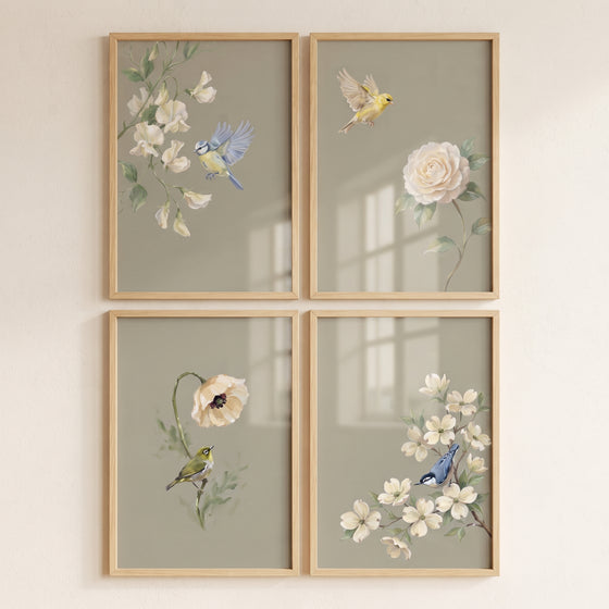 Shabby chic garden bird floral wall art set of 4 features birds and blossoms on muted green in light wood frames.