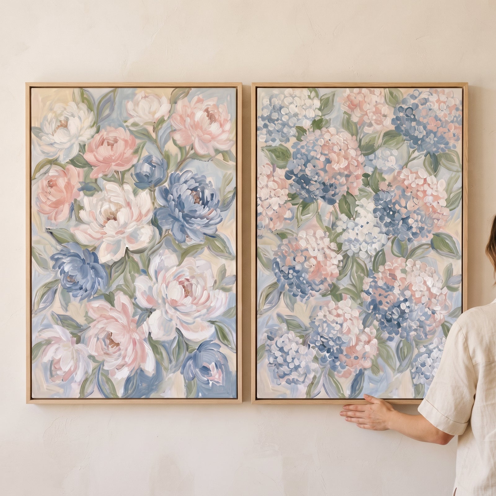 Shabby chic pastel floral wall art set of 2 featuring soft pink and blue flower designs in natural wood frames.