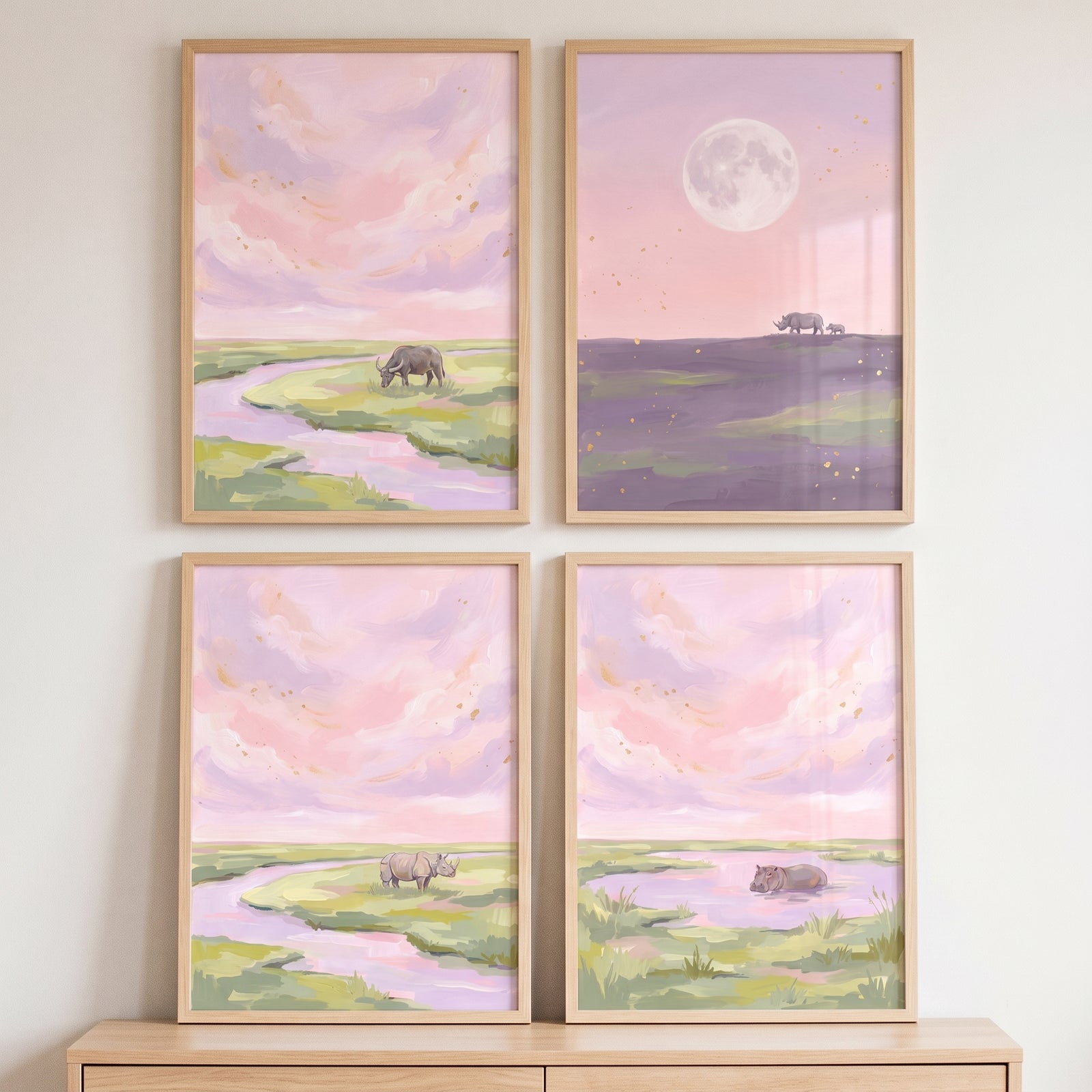 Shimmering sky safari animals wall art set of 4 featuring a buffalo, rhinos, and a hippo in dreamy pastel landscapes.