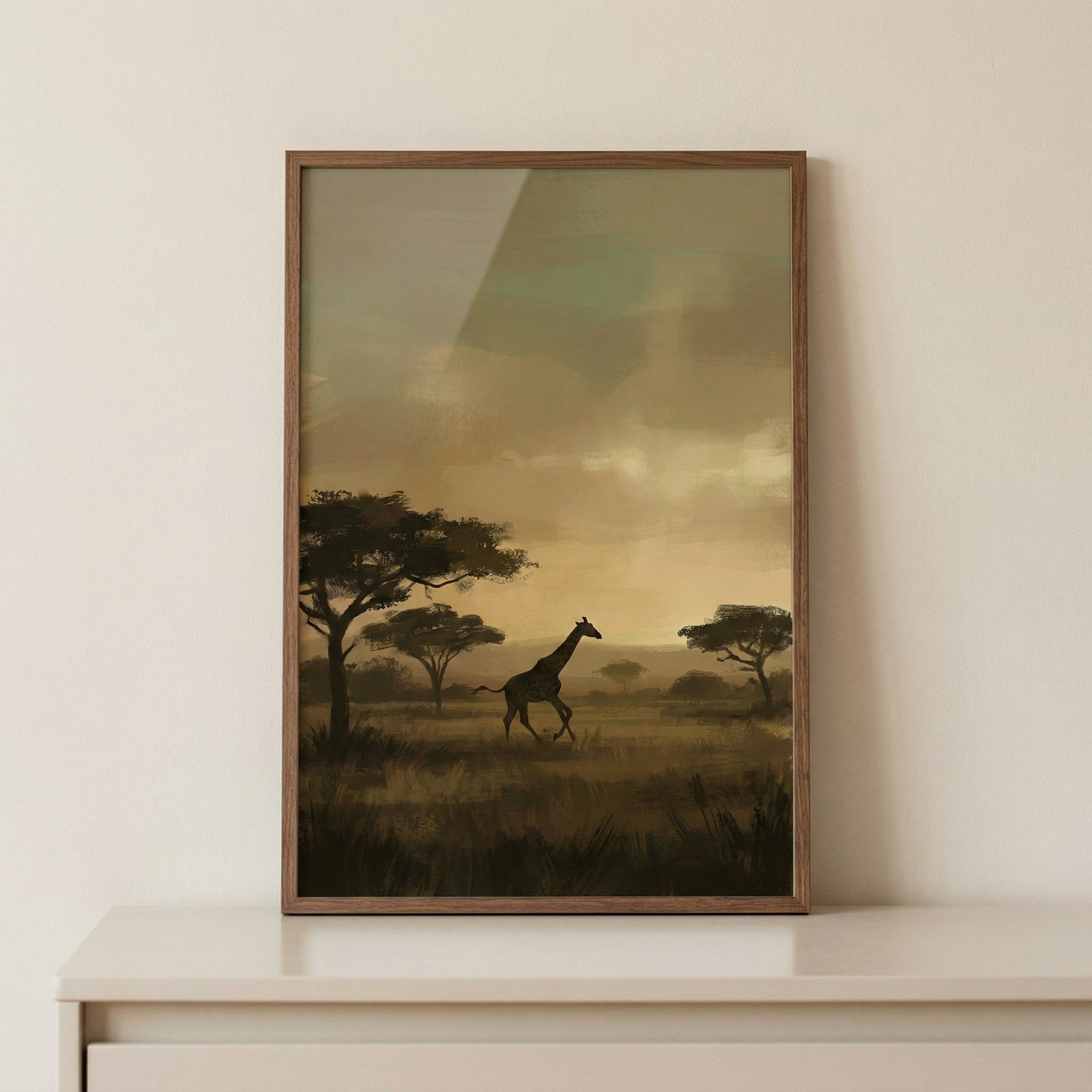 Silhouette sunset savanna giraffe wall art in a wooden frame shows a giraffe walking past acacia trees at dusk.