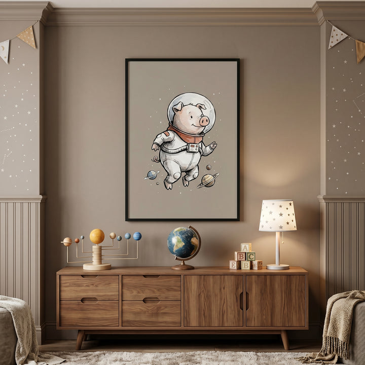 Sketch style space pig wall art hangs above a wooden sideboard with a globe and solar system model in a neutral room.