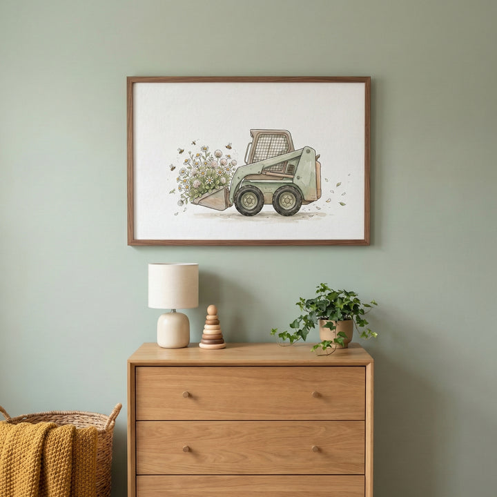 Nature-themed wall art of a green mini loader filled with wildflowers and bees, hung above a wooden dresser in a muted green nursery with minimalist decor.