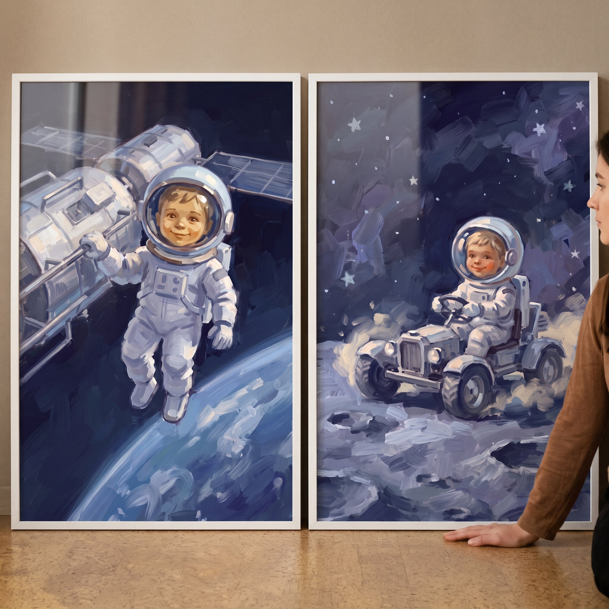 Smiling celestial baby astronaut wall art set of 2 shows a baby floating near a satellite and driving a moon rover.