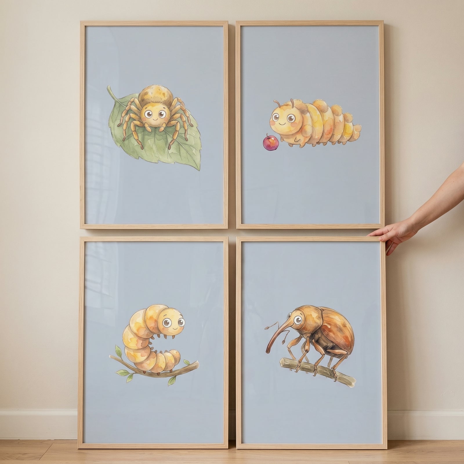 Smiling golden garden bug wall art set of 4 in wood frames features cute insect and spider characters on blue.
